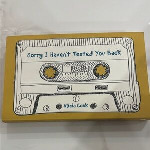 Yellow and White Cassette Tape Drawing Book